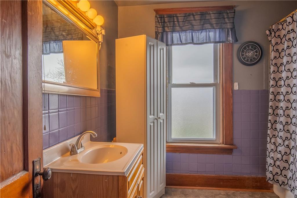 210 Wallula Avenue Butler, PA 16001 - Photo 20 of 33 a bathroom with a sink and a mirror