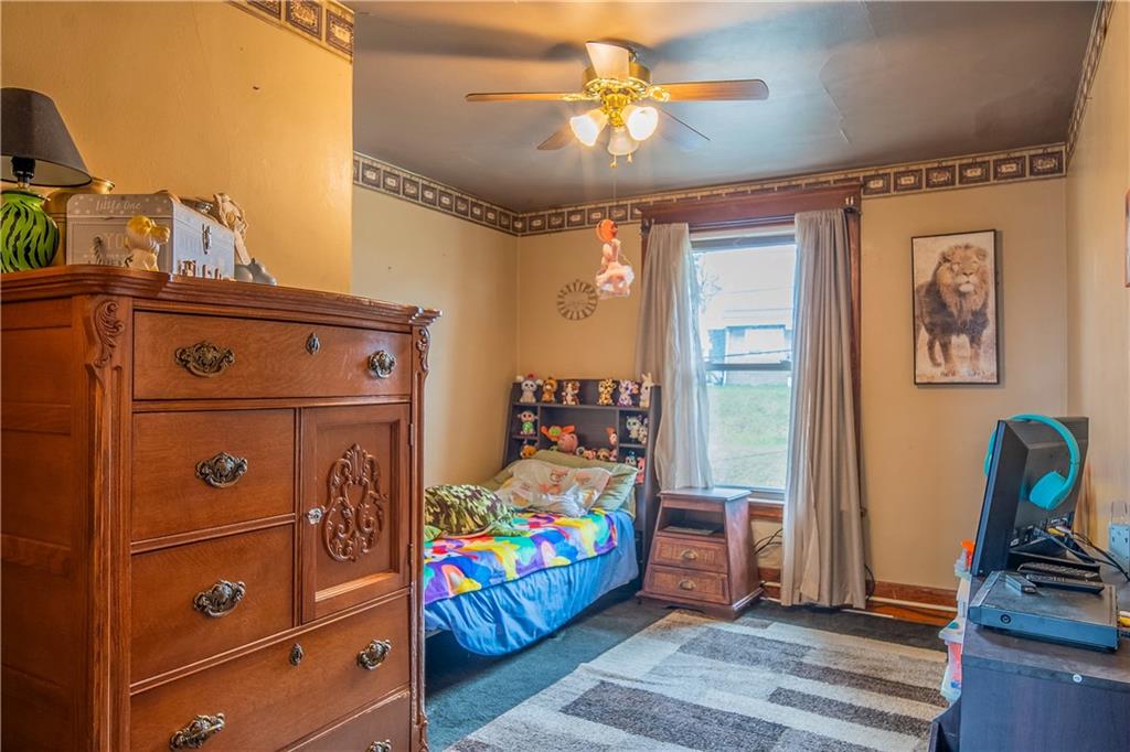 210 Wallula Avenue Butler, PA 16001 - Photo 22 of 33 a bed room with a bed and a baby crib