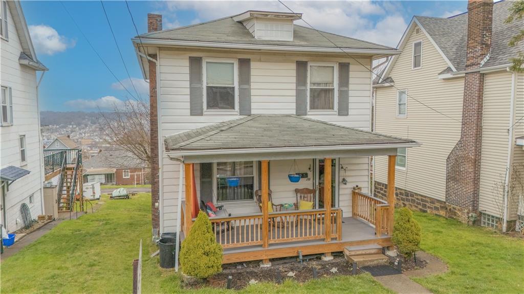 210 Wallula Avenue Butler, PA 16001 - Photo 33 of 33 a view of a house with a small yard and wooden floor and fence