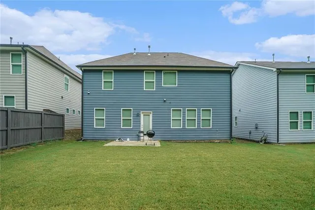 a view of a backyard with a garden