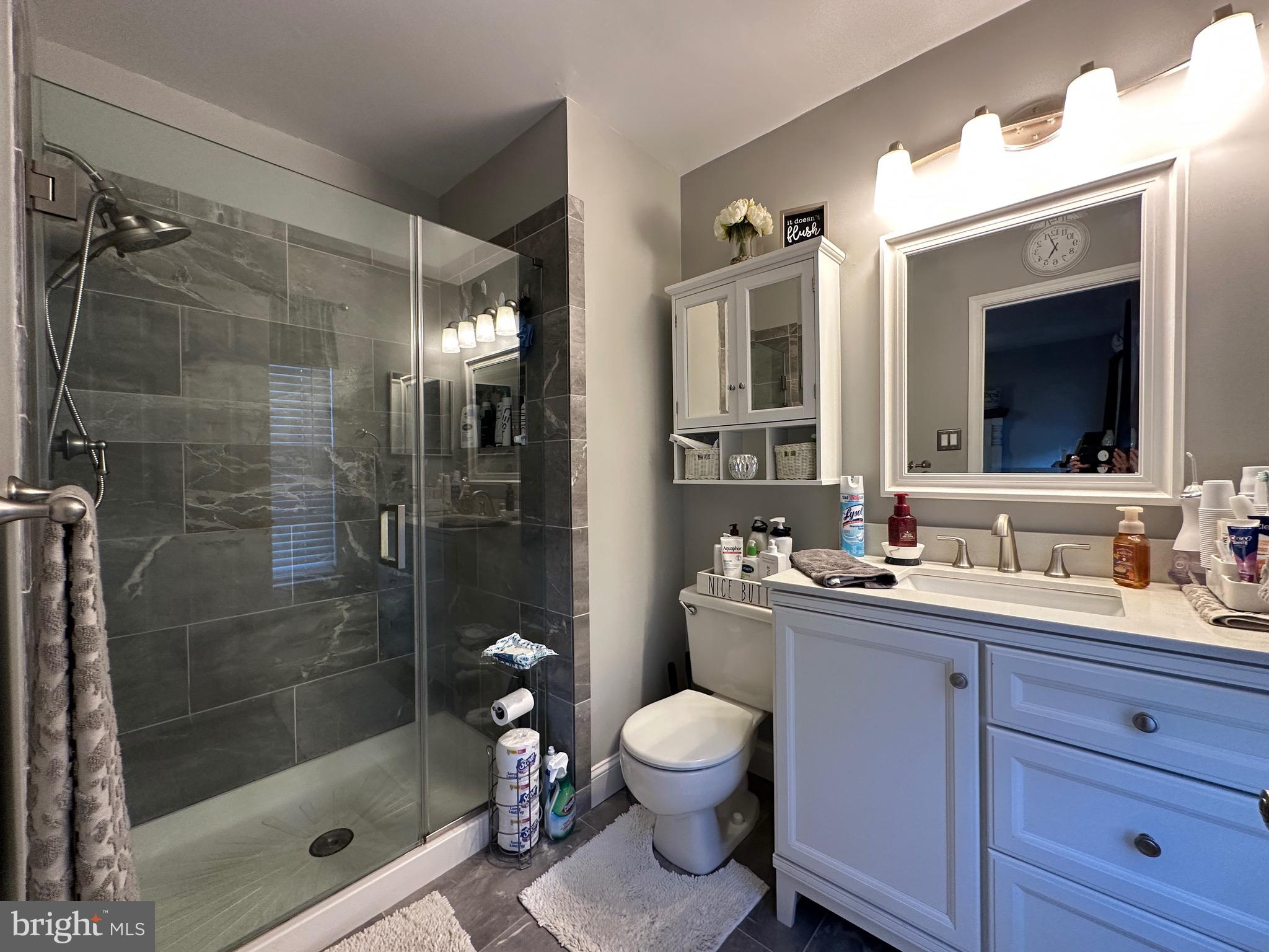 4 Sylvan Court Clementon, NJ 08021 - Photo 32 of 55 a bathroom with a sink a toilet and shower