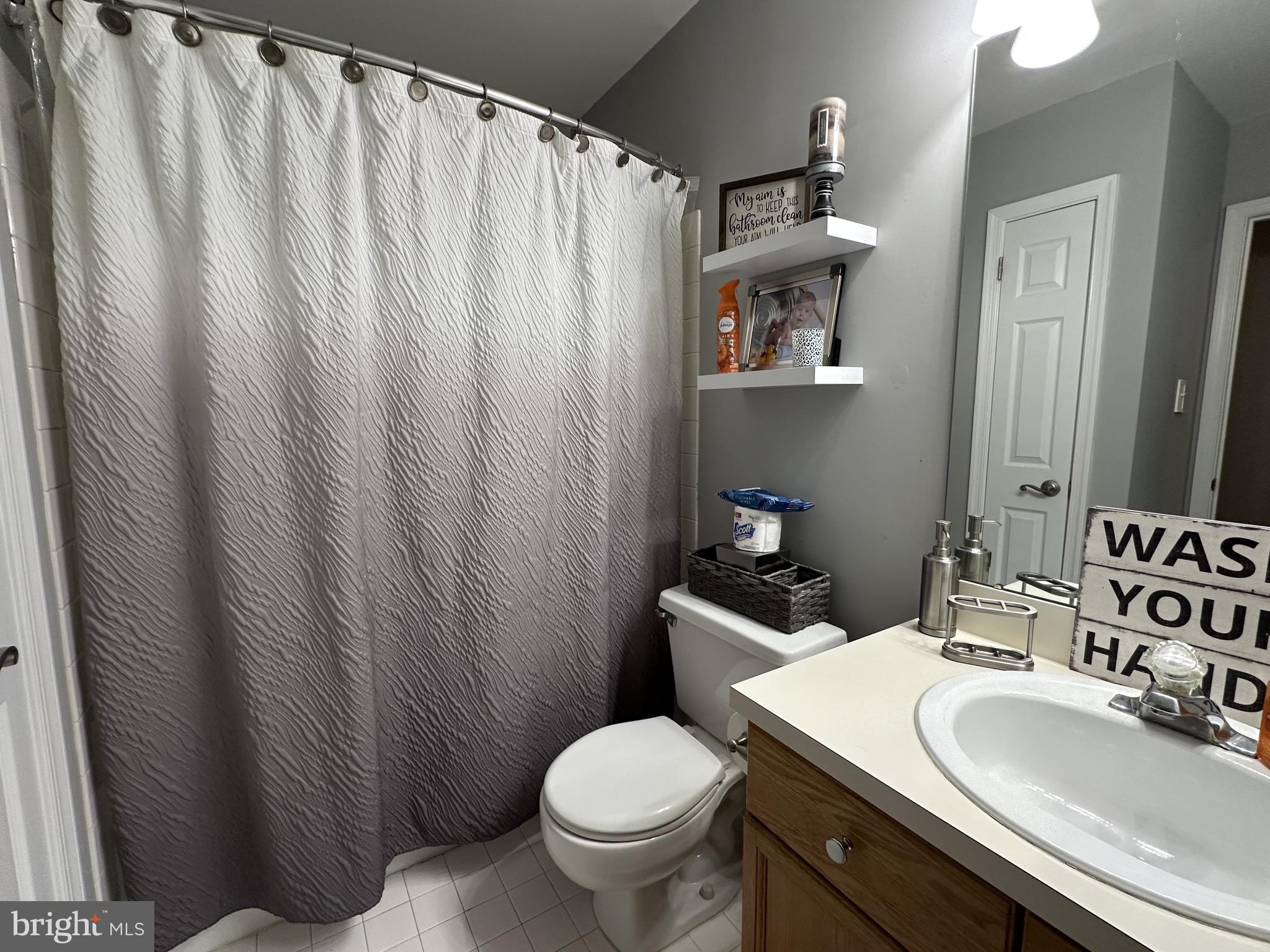 4 Sylvan Court Clementon, NJ 08021 - Photo 34 of 55 a bathroom with a sink toilet and mirror