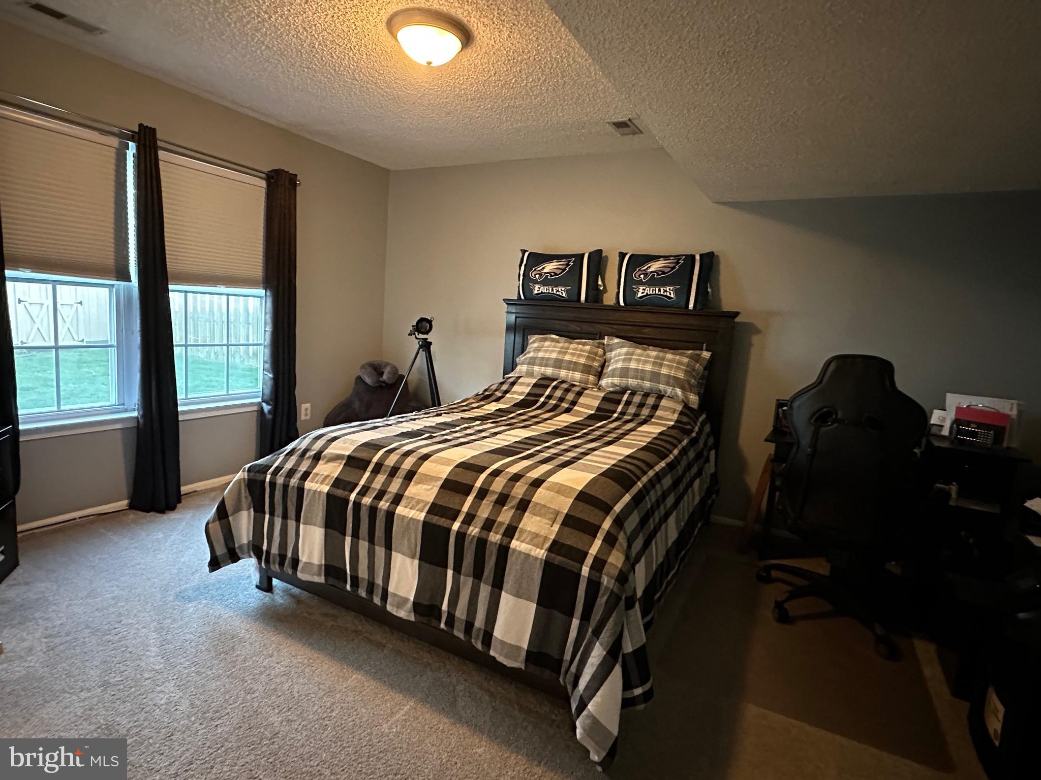 4 Sylvan Court Clementon, NJ 08021 - Photo 37 of 55 a bed sitting in a bedroom next to a window