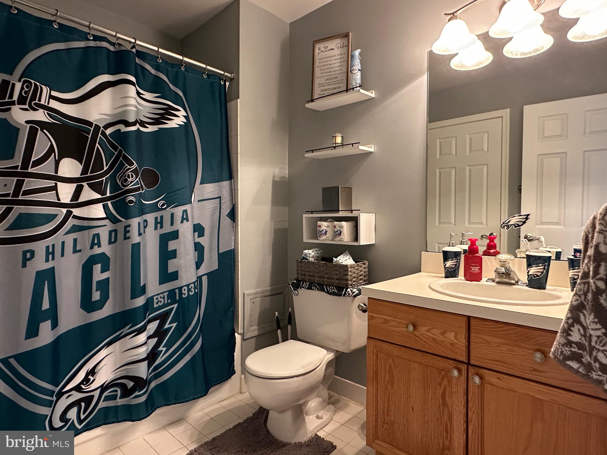 4 Sylvan Court Clementon, NJ 08021 - Photo 38 of 55 a bathroom with a sink a toilet and a mirror