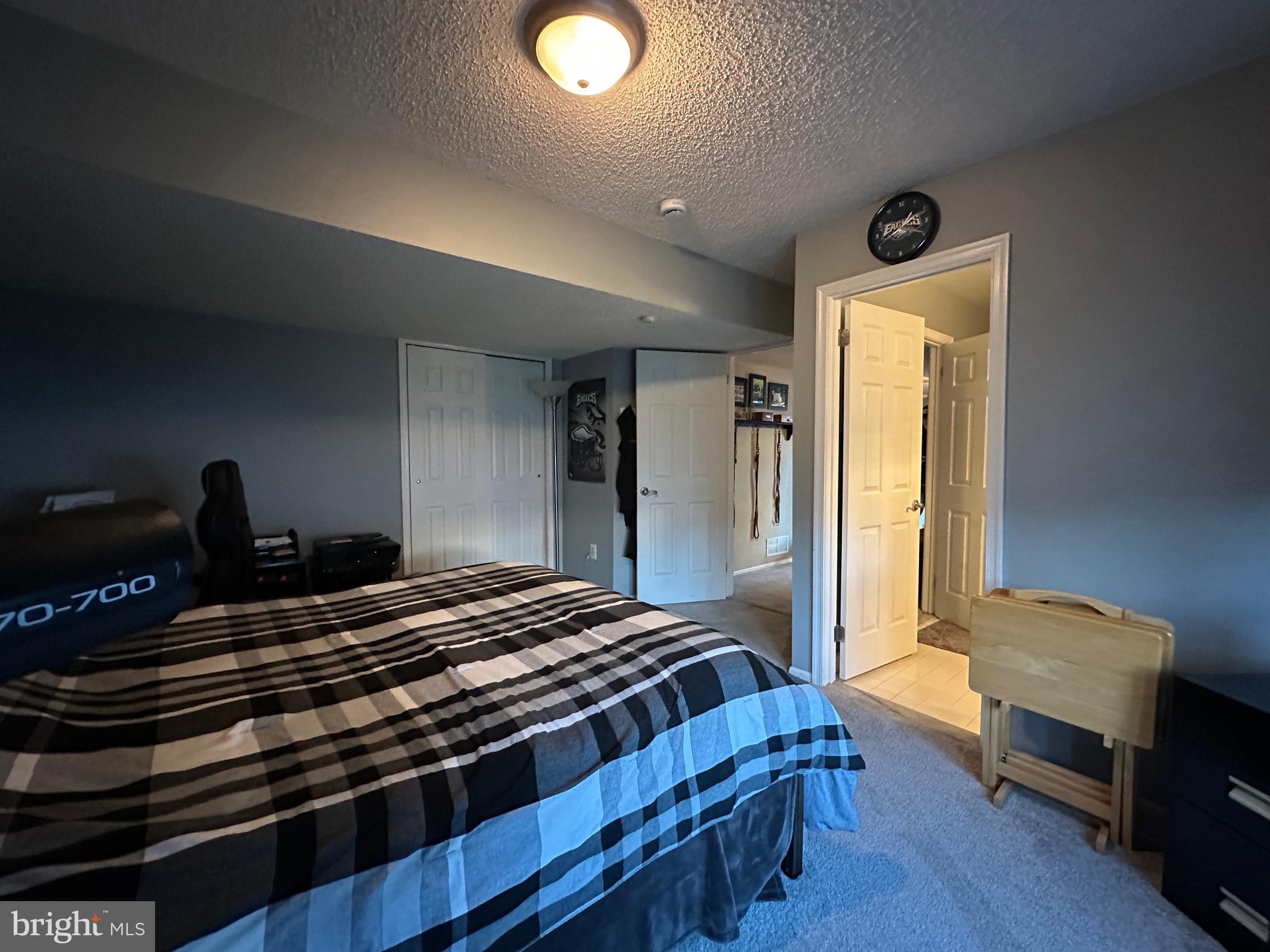 4 Sylvan Court Clementon, NJ 08021 - Photo 39 of 55 a bedroom with a bed and a dresser next to a window