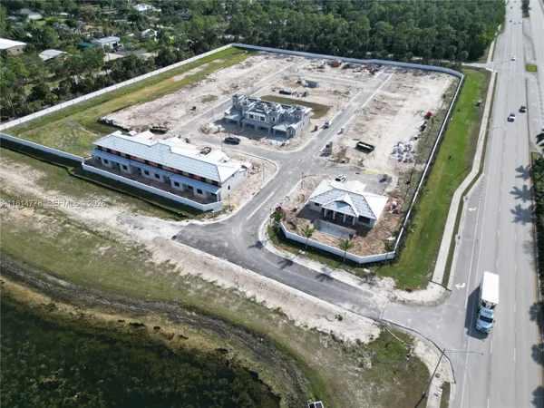 a view of balcony with wooden floor
