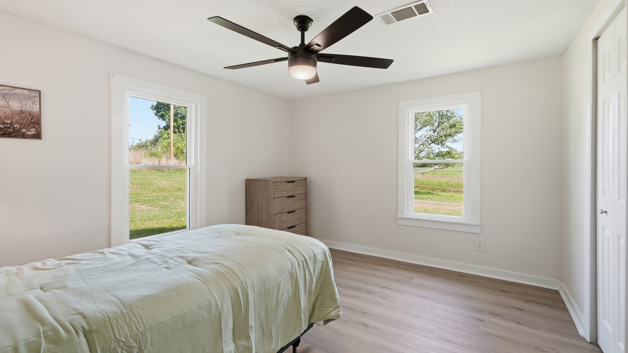 469 Fred Cooper Road McMinnville, TN 37110 - Photo 22 of 46 a bedroom with a bed and a window