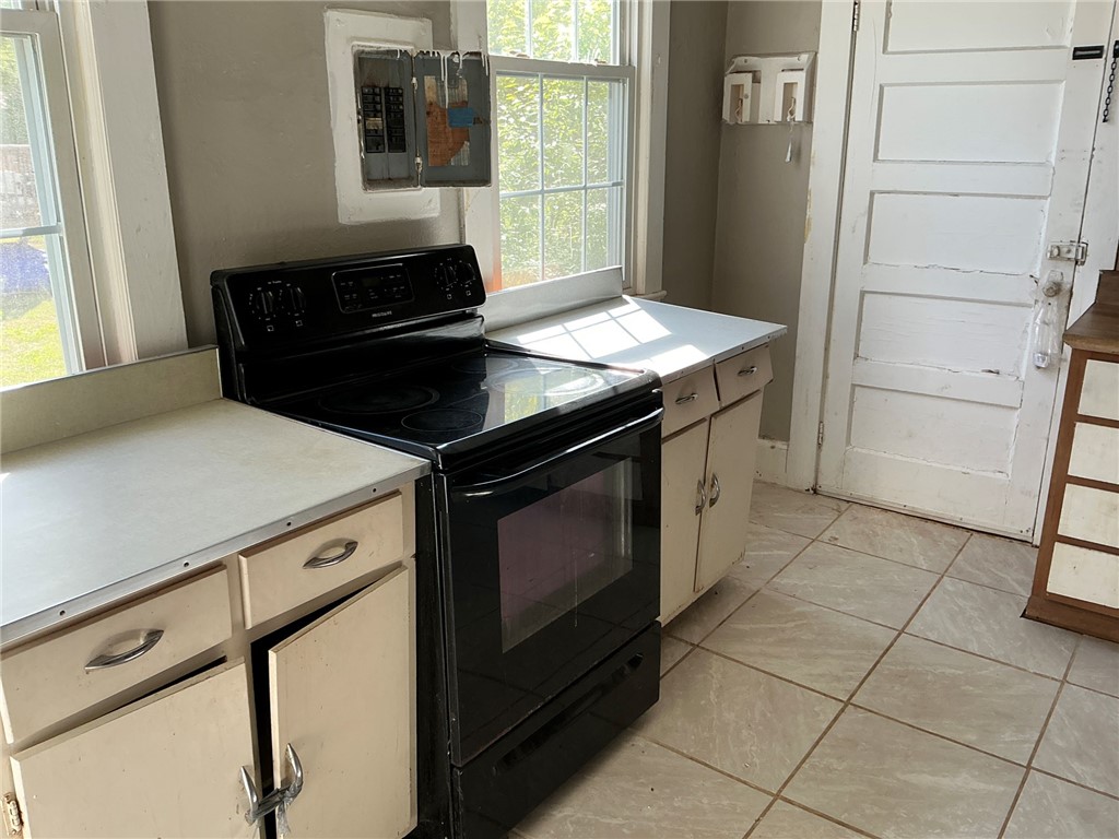 14 Ames Street Seneca, SC 29678 - Photo 13 of 16 This kitchen offers a practical layout and plenty of light, ideal for everyday living.
