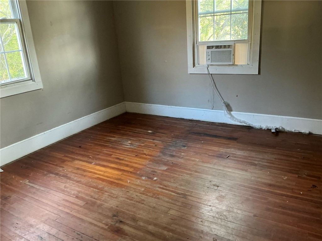 14 Ames Street Seneca, SC 29678 - Photo 7 of 7 This spacious room features rich hardwood flooring, ready for your personal touch.