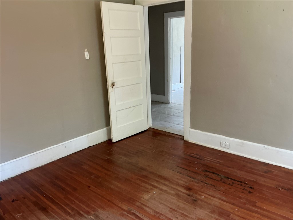 14 Ames Street Seneca, SC 29678 - Photo 10 of 16 This interior space showcases warm wood floors and clean walls, ready for your personal touch.