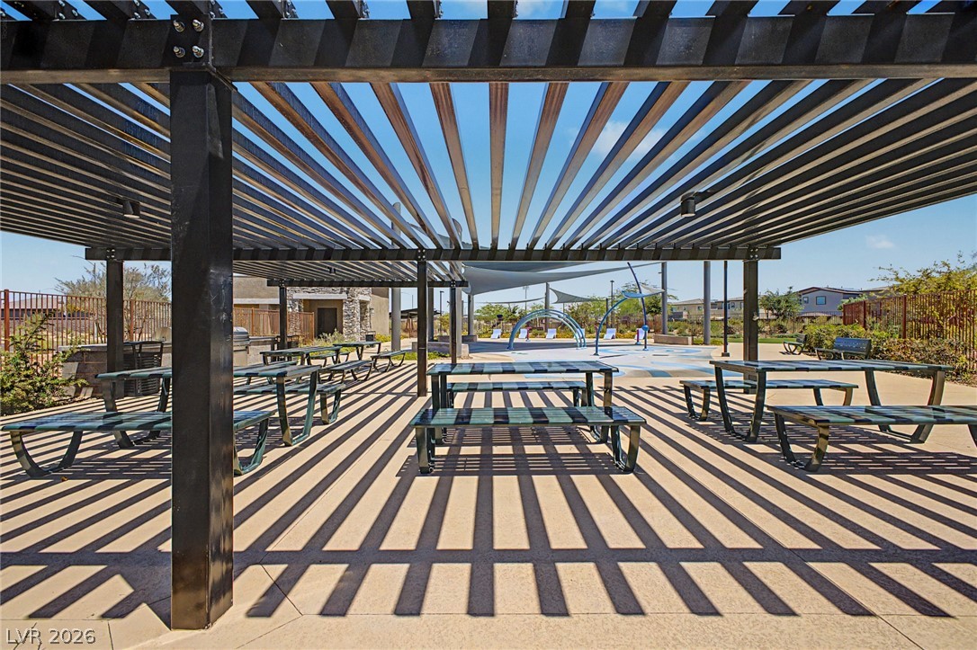 226 Augusta Ridge Henderson, NV 89015 - Photo 47 of 47 This inviting outdoor space features a modern pergola and convenient picnic areas.