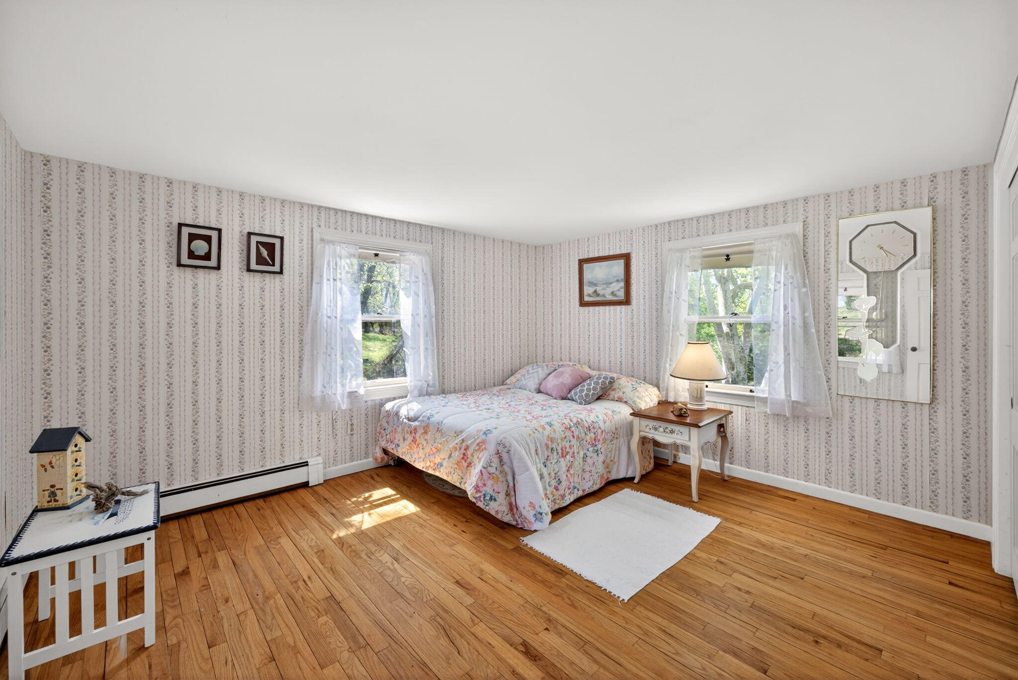 23 Nickerson Road Orleans, MA 02653 - Photo 13 of 54 a bedroom with a bed and window