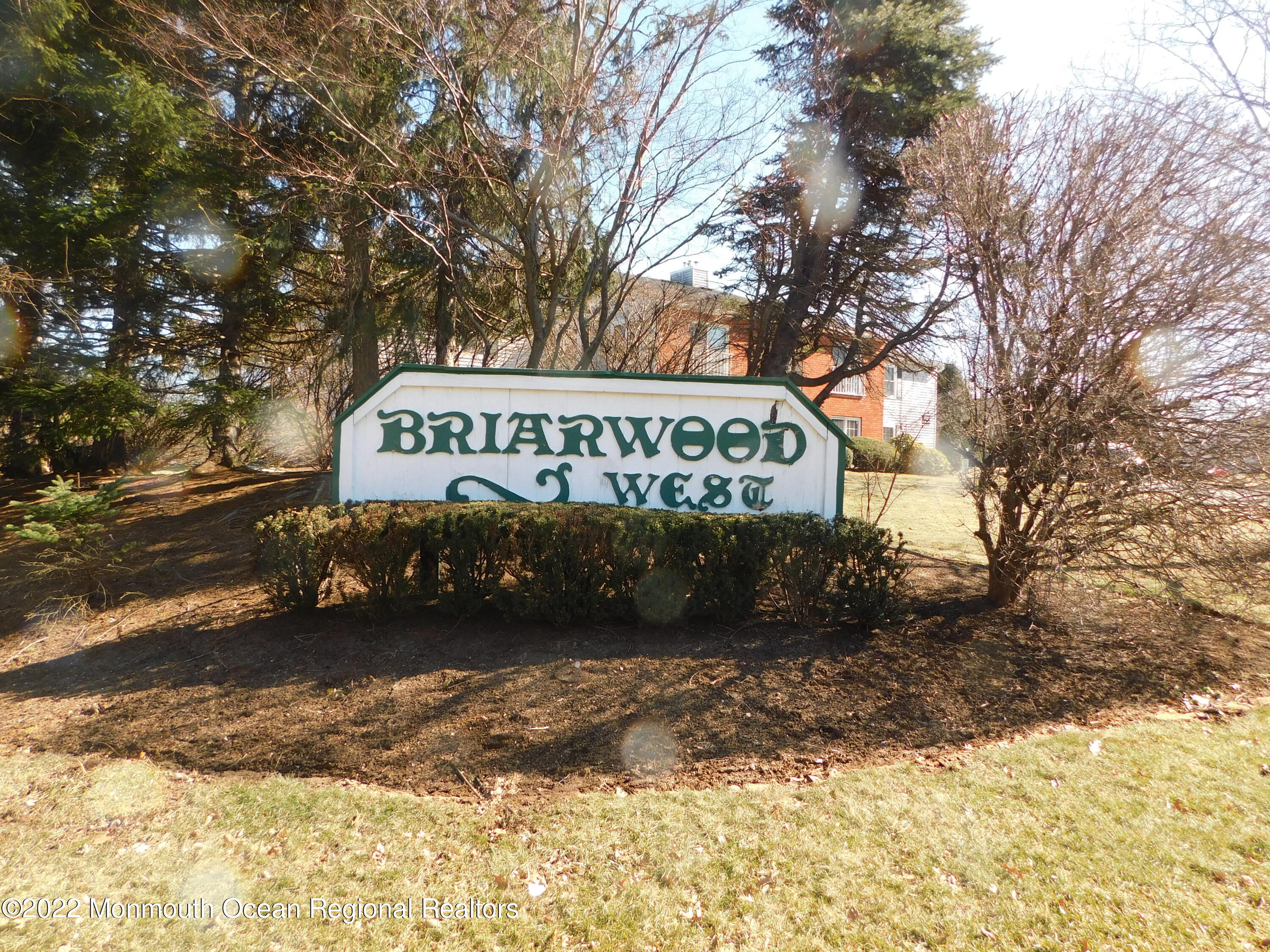 716 Zlotkin Circle, Unit 4 Freehold, NJ 07728 - Photo 1 of 10 a view of outdoor space with sign board