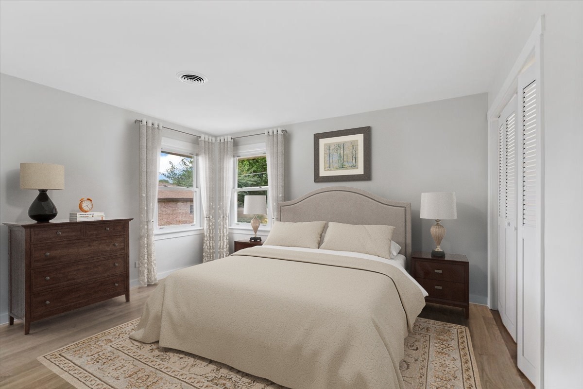 10206 South St Louis Avenue Evergreen Park, IL 60805 - Photo 15 of 33 a bedroom with a bed and a cabinets