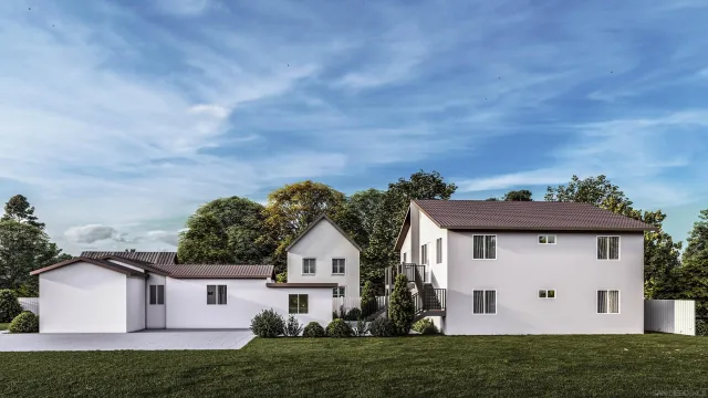 front view of a house with a yard