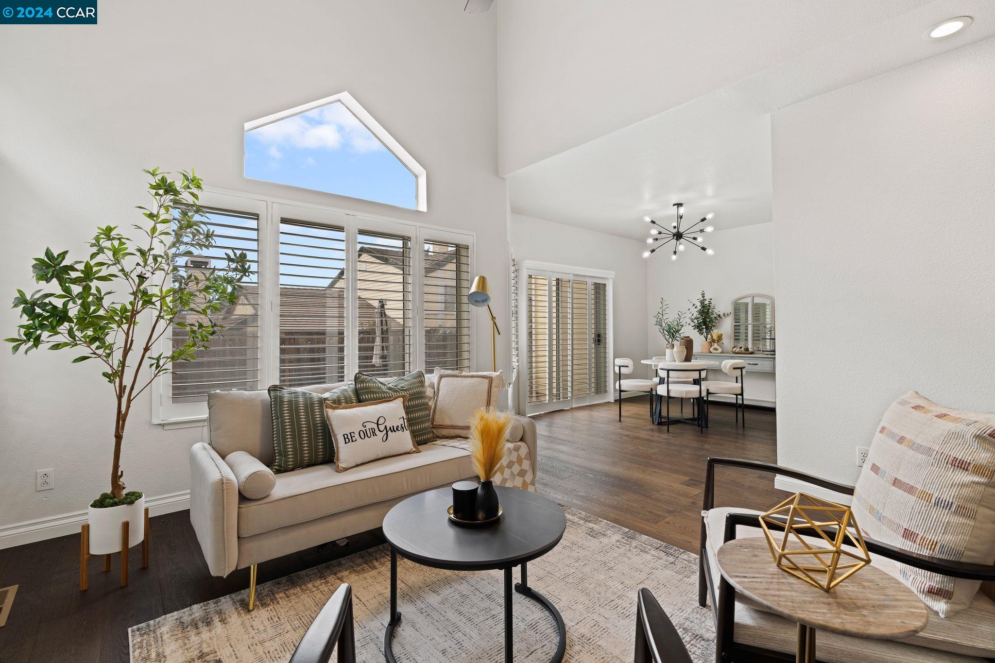 1189 Shell Lane Clayton, CA 94517 - Photo 1 of 1 a living room with furniture and a large window