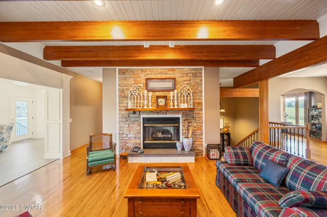 a living room with furniture and windows