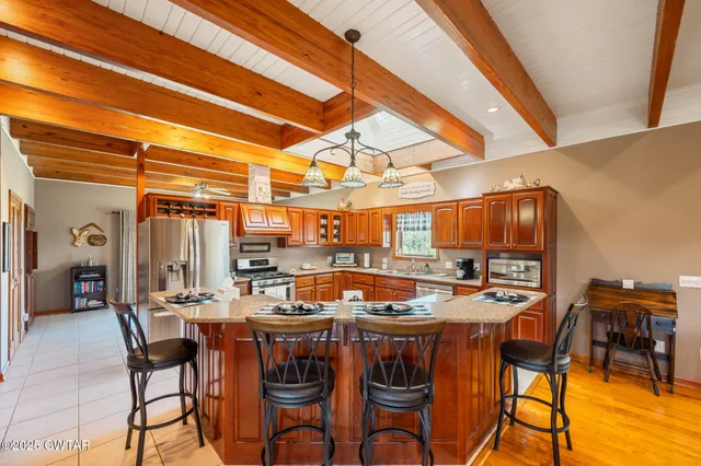 a bedroom with a bed and a desk