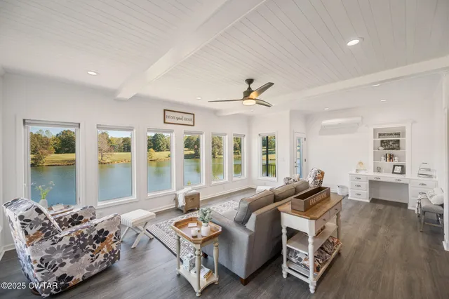 a bath tub sitting in a bathroom next to a window