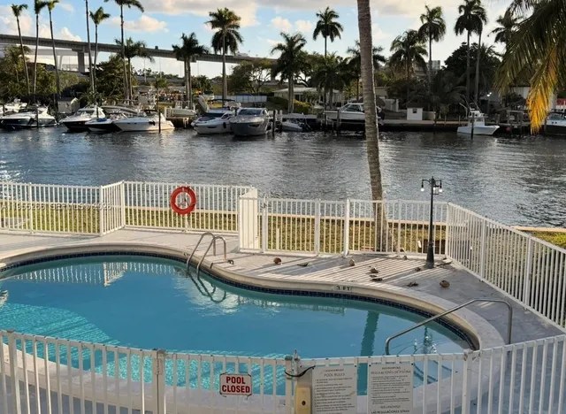 a view of a house with swimming pool