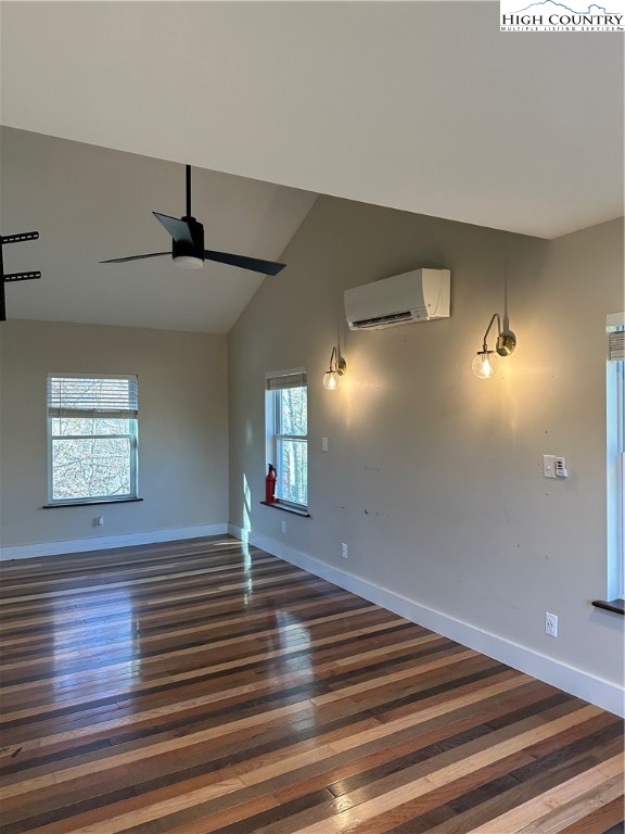 3242 Howard's Creek Road Boone, NC 28607 - Photo 19 of 33 a view of an empty room with wooden floor and a window