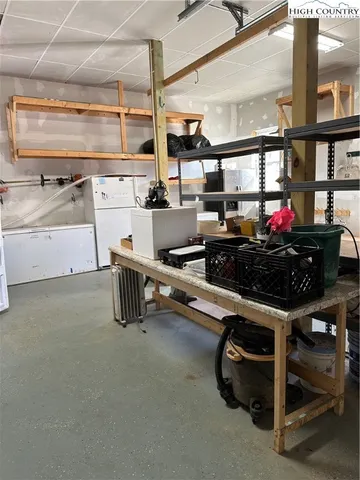 a view of a field with a mountain in the background