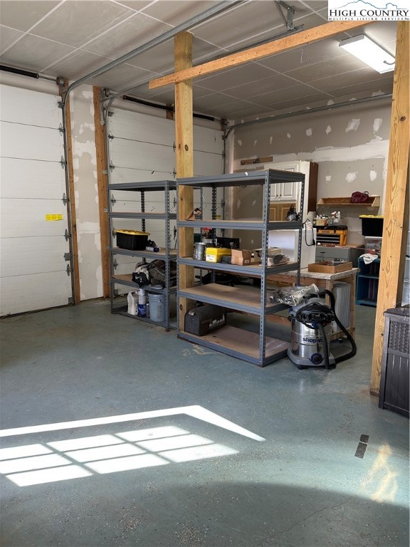 3242 Howard's Creek Road Boone, NC 28607 - Photo 27 of 33 a view of a room with gym equipment