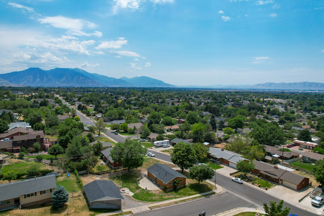 120 North 1230 E Street Springville, UT 84663 - Photo 50 of 60 Expansive neighborhood setting featuring numerous mature trees and a distant mountain range backdrop