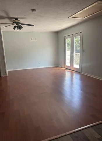 a kitchen with stainless steel appliances a sink stove and cabinets