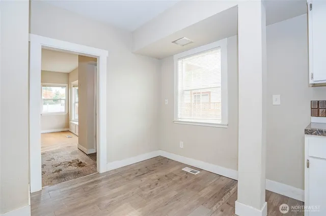 a view of a room that has a window in it