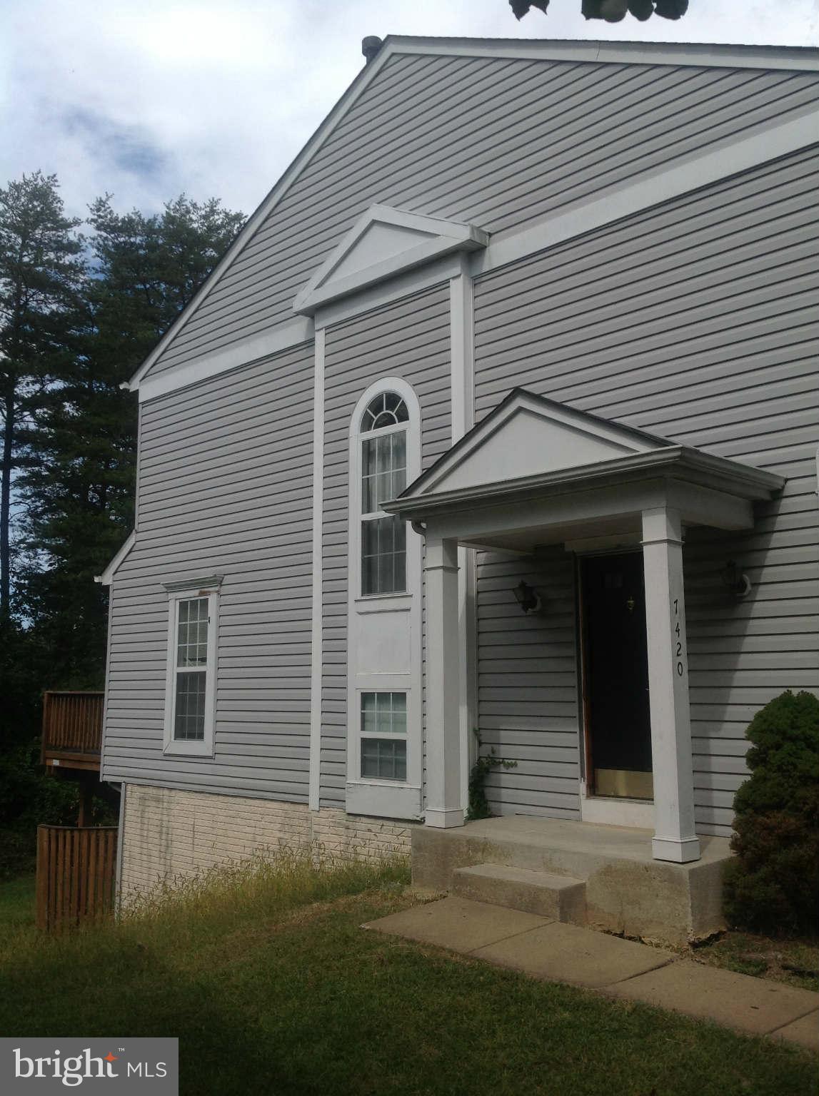 7420 Maury Road Baltimore, MD 21244 - Photo 2 of 3 a front view of a house with a yard