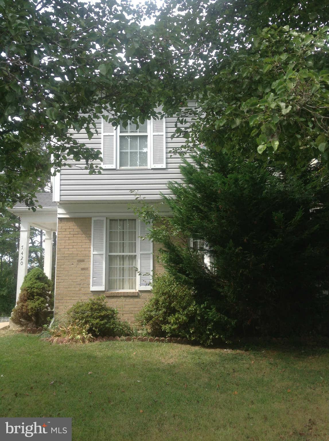 7420 Maury Road Baltimore, MD 21244 - Photo 3 of 3 a house view with a garden space