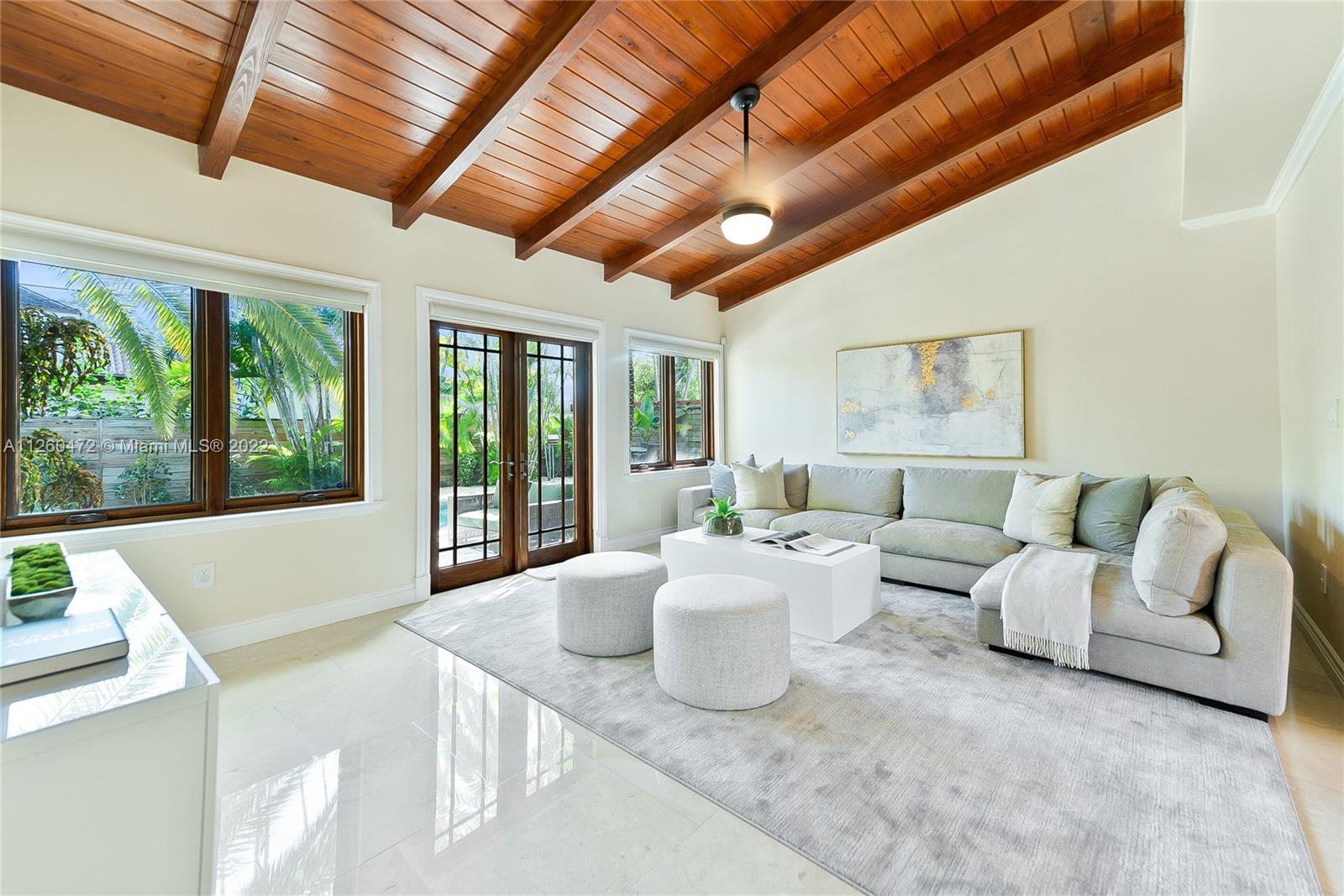 2153 North Bay Road Miami Beach, FL 33140 - Photo 7 of 19 a living room with furniture and a large window