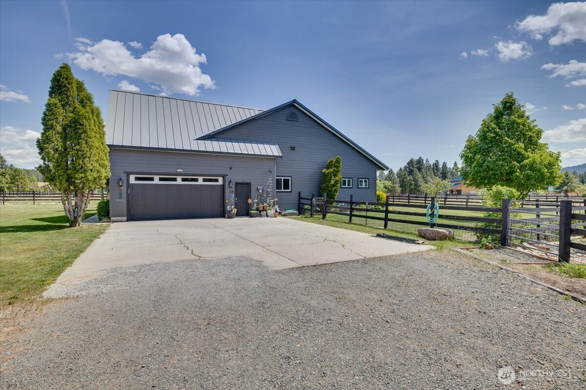 644 Masterson Road Cle Elum, WA 98922 - Photo 7 of 40 a house with trees in front of it