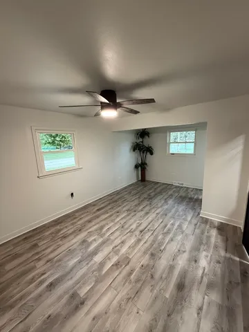 a view of an empty room and window