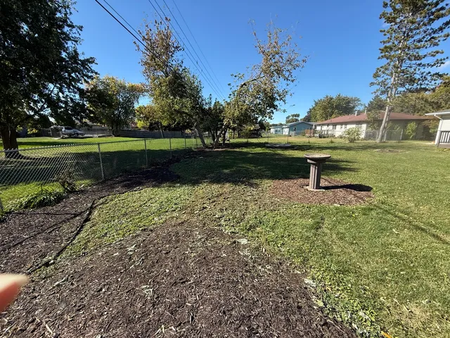 a view of a lake view with a bench
