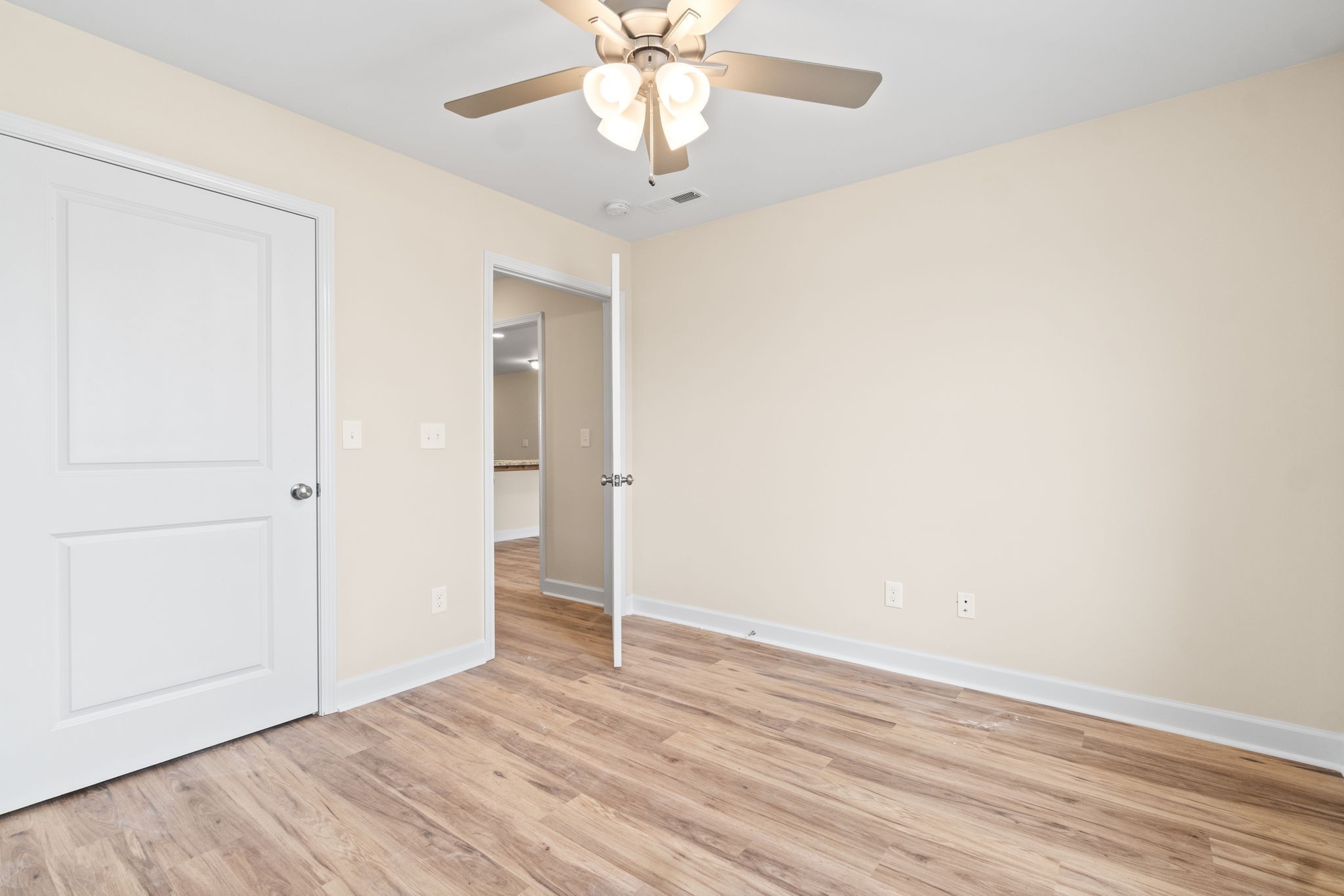 9540 Russellville Road, Unit B Guthrie, KY 42234 - Photo 14 of 18 a view of an empty room with wooden floor