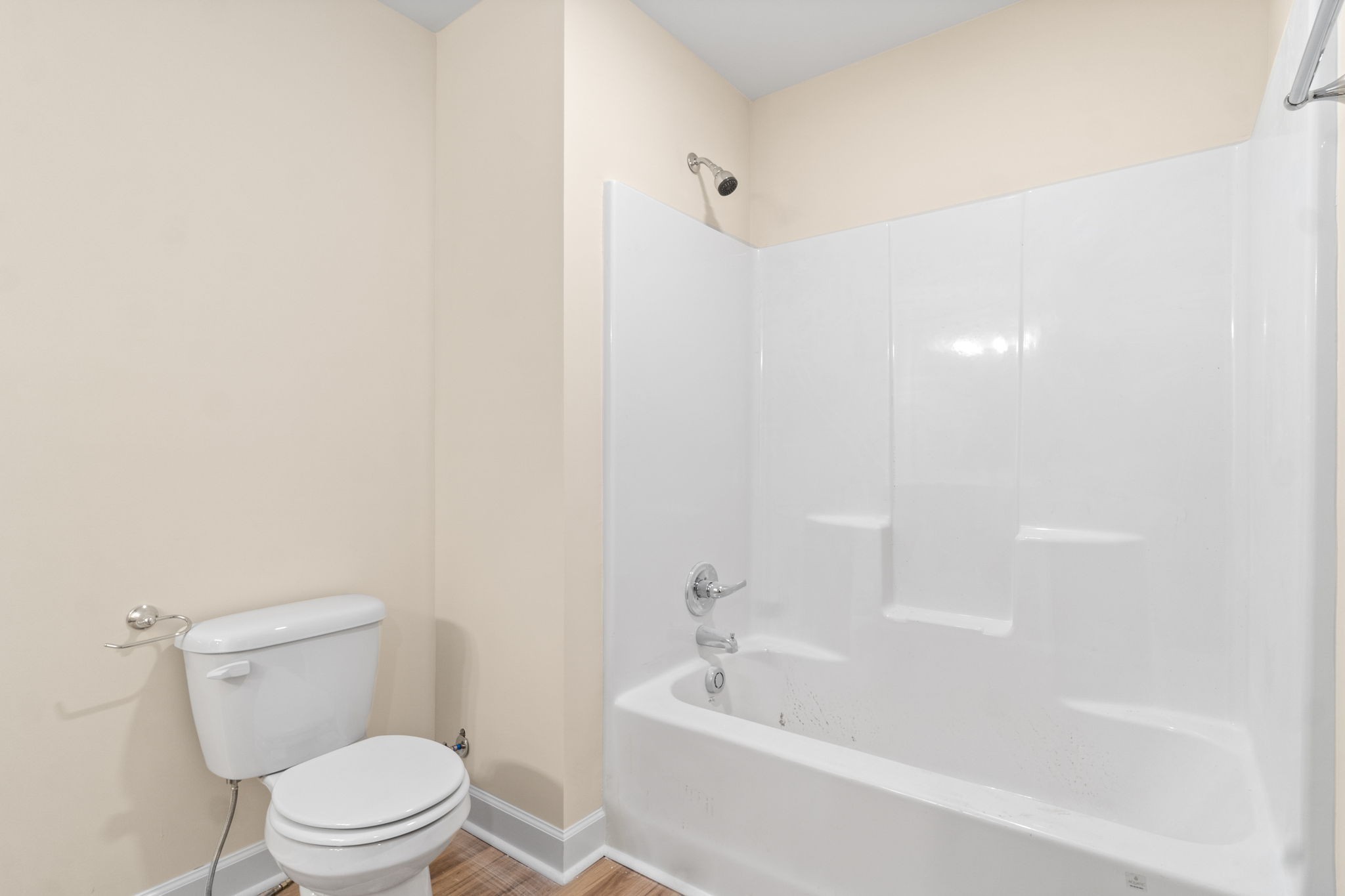 9540 Russellville Road, Unit B Guthrie, KY 42234 - Photo 15 of 18 a white toilet sitting next to a bath tub