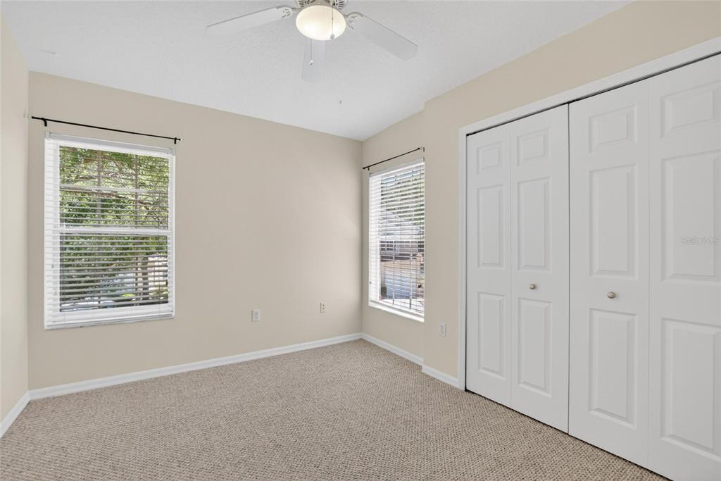 6418 Rosefinch Court, Unit 103 Lakewood Ranch, FL 34202 - Photo 22 of 48 an empty room with windows