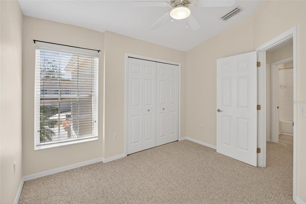6418 Rosefinch Court, Unit 103 Lakewood Ranch, FL 34202 - Photo 23 of 48 a view of an empty room with a window