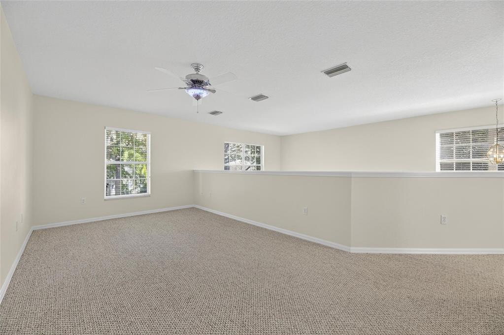 6418 Rosefinch Court, Unit 103 Lakewood Ranch, FL 34202 - Photo 28 of 52 a view of an empty room with a window