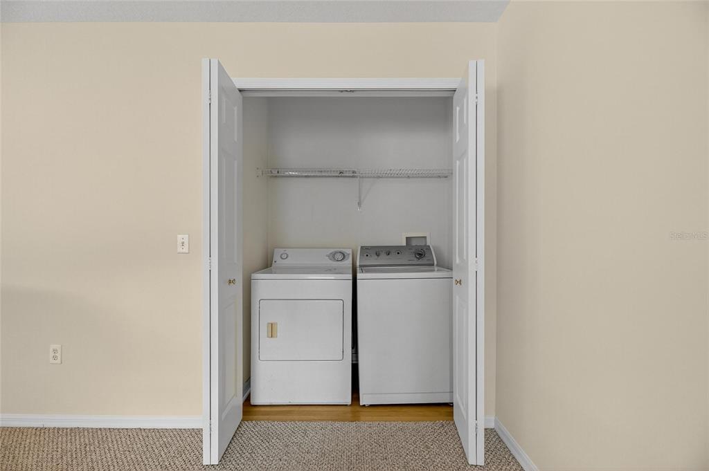 6418 Rosefinch Court, Unit 103 Lakewood Ranch, FL 34202 - Photo 30 of 52 a utility room with dryer and washer