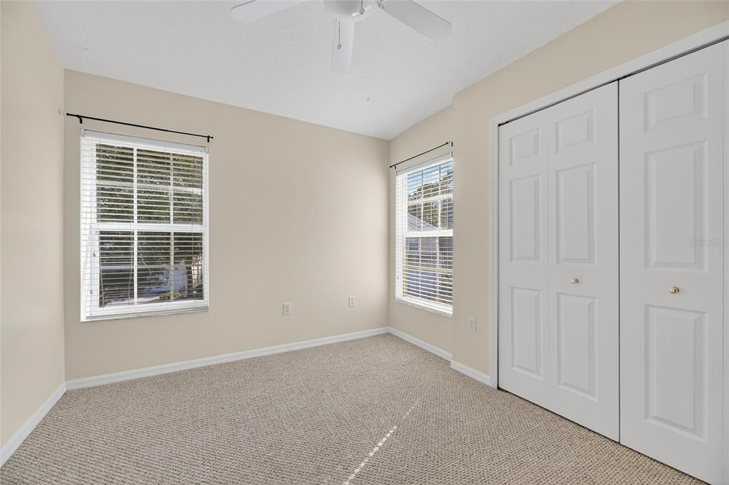 6418 Rosefinch Court, Unit 103 Lakewood Ranch, FL 34202 - Photo 32 of 52 an empty room with windows