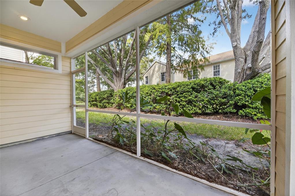 6418 Rosefinch Court, Unit 103 Lakewood Ranch, FL 34202 - Photo 35 of 48 a view of a garden from a windows