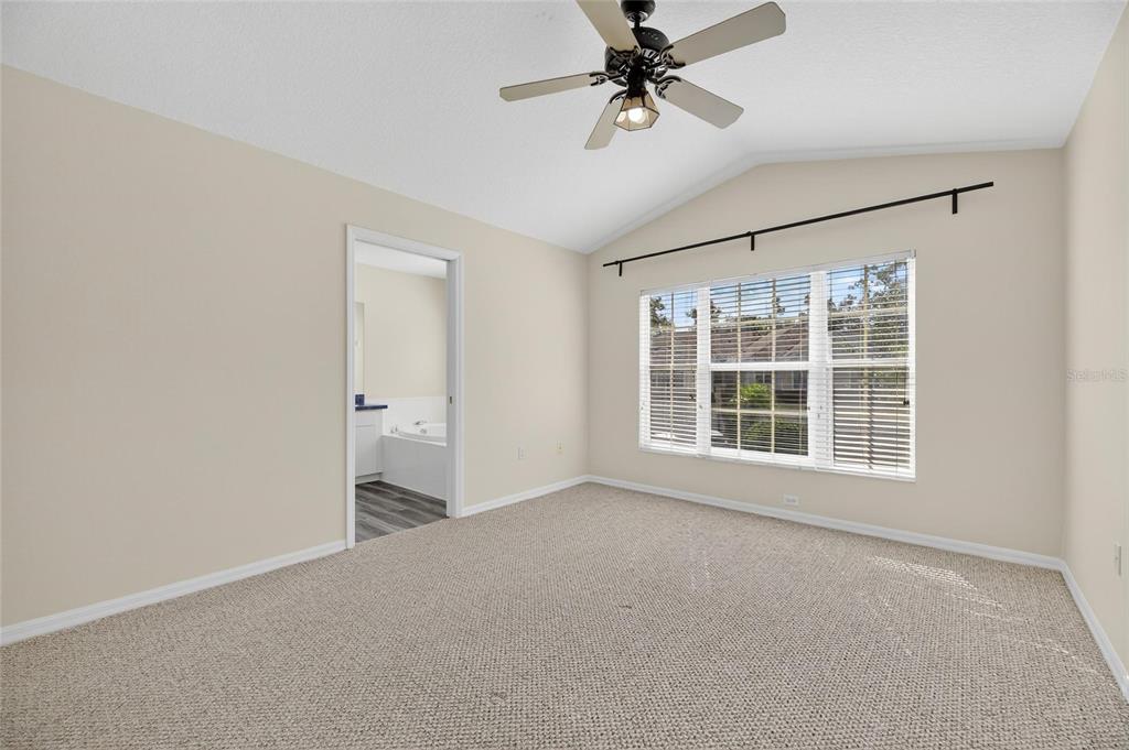 6418 Rosefinch Court, Unit 103 Lakewood Ranch, FL 34202 - Photo 39 of 52 a view of an empty room with a window