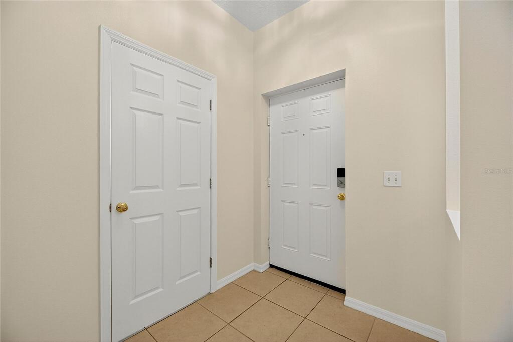 6418 Rosefinch Court, Unit 103 Lakewood Ranch, FL 34202 - Photo 4 of 52 a view of an empty room