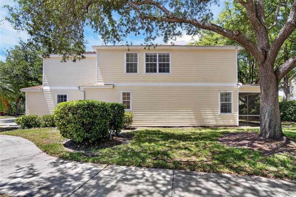 6418 Rosefinch Court, Unit 103 Lakewood Ranch, FL 34202 - Photo 48 of 48 front view of a house with a small yard