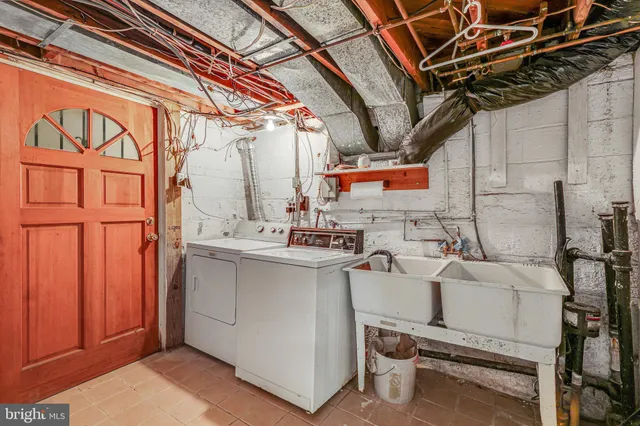 a white refrigerator freezer sitting inside of a kitchen