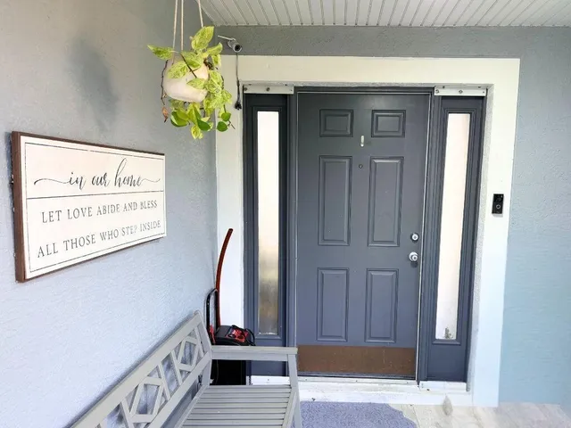 a view of a hallway to a house