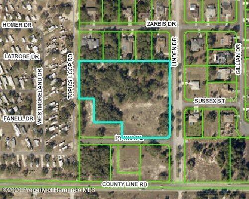 Linden Dr Spring Hill Spring Hill, FL 34609 - Photo 1 of 1 a sign that is on the side of a building